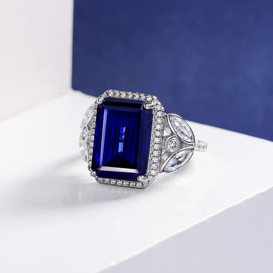 Dazzle Royal Blue Emerald Cut Lab Grown Diamonds 18k White Gold Plated Engagement Ring